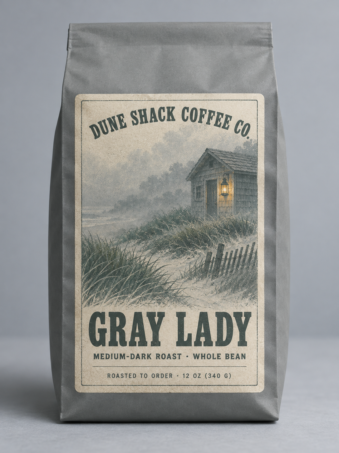 Gray Lady medium-dark roast coffee bag with retro foggy shack and lantern label